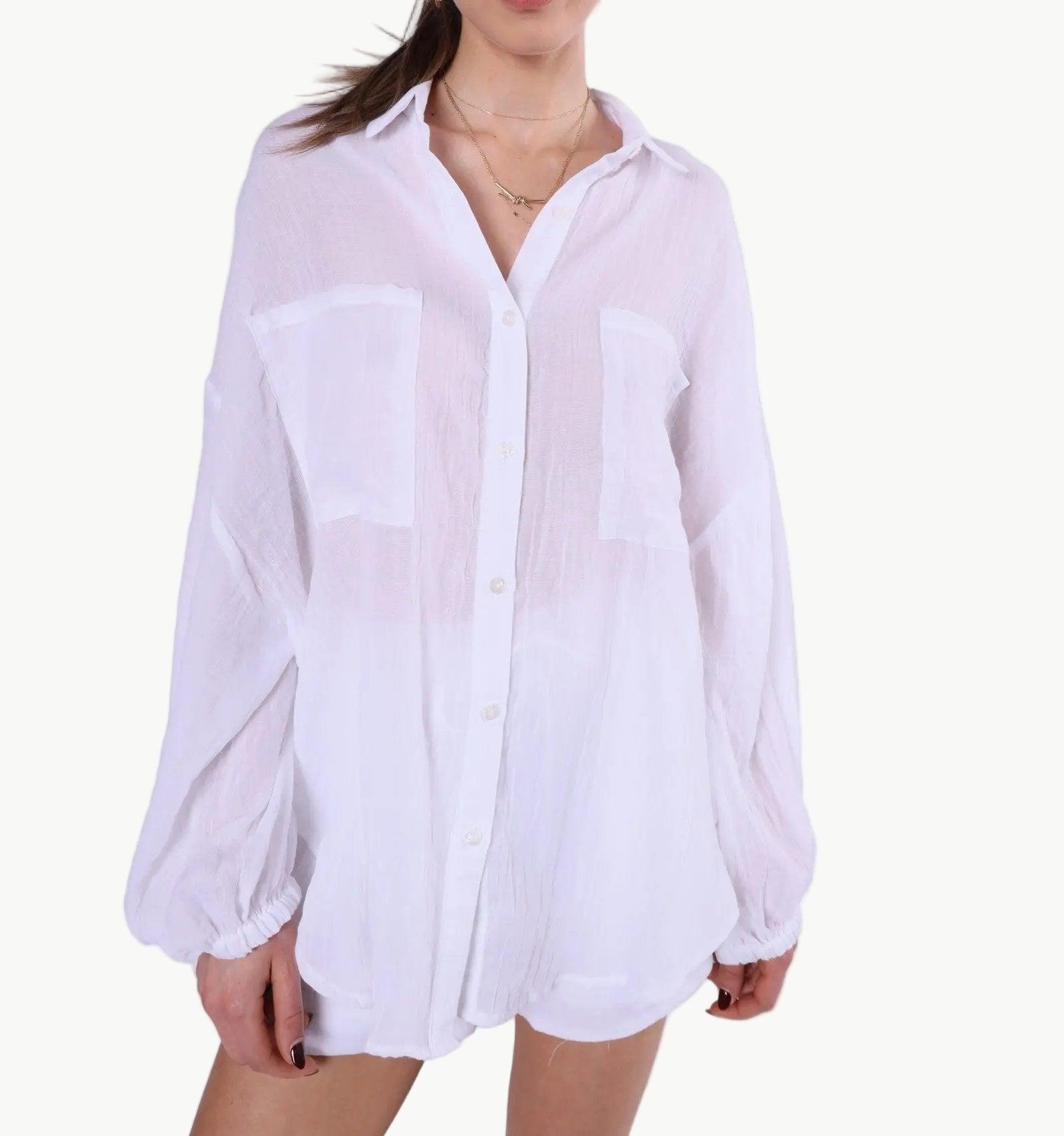 La Libéré model White button-up shirt worn by a person on a plain background